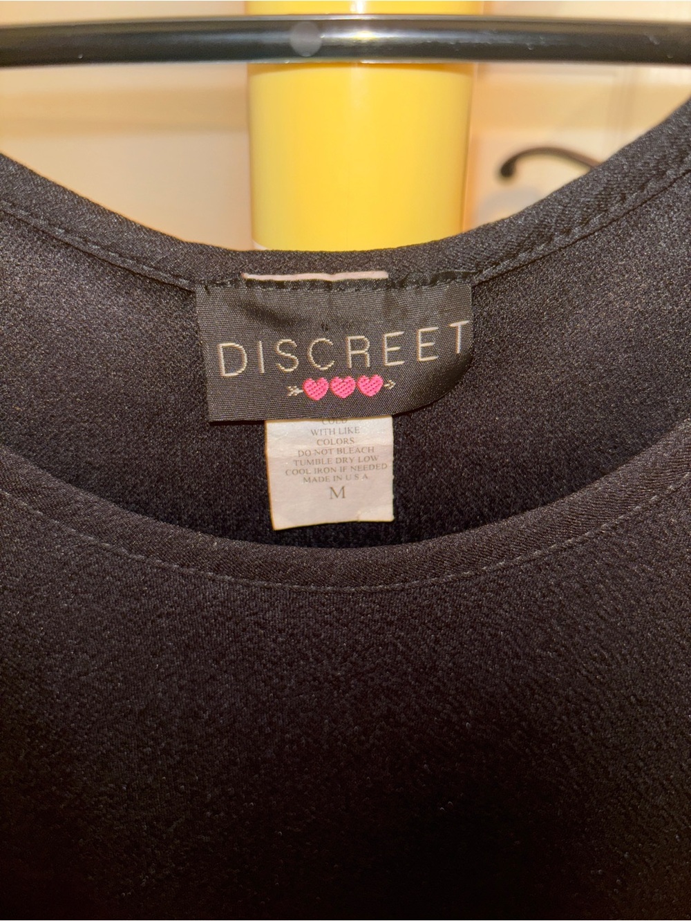 Discreet Black Peplum Tank
